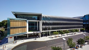 Broadcasting studios have a prime view of South Bank Parklands from the cantilevered glass boxes